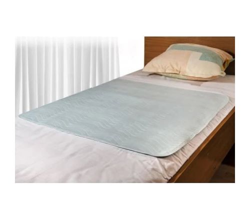 MultiMotion wasbare onderlegger op een matras