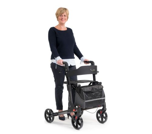 Multimotion Double rollator antraciet met oudere vrouw er achter